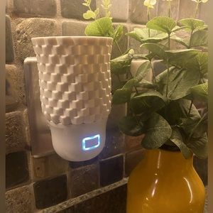 Scentsy Wall Diffuser- infrequently used, like new! Two pods included.